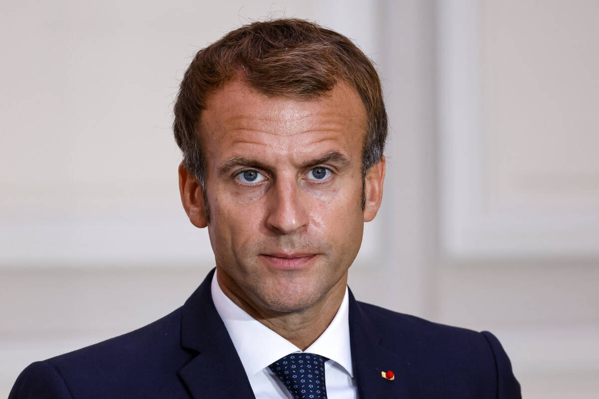 French President Emmanuel Macron looks on at The Elysee Palace in Paris in this AP file photo. ...