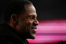 FILE - Former Oakland Raiders player Eric Allen stands on the sidelines during an NFL football ...