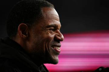 FILE - Former Oakland Raiders player Eric Allen stands on the sidelines during an NFL football ...