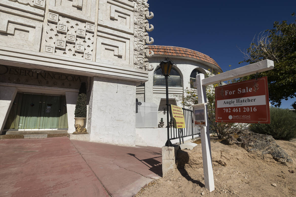 A "for sale" sign is seen outside of the first of three homes that Lonnie Hammargren owned on T ...
