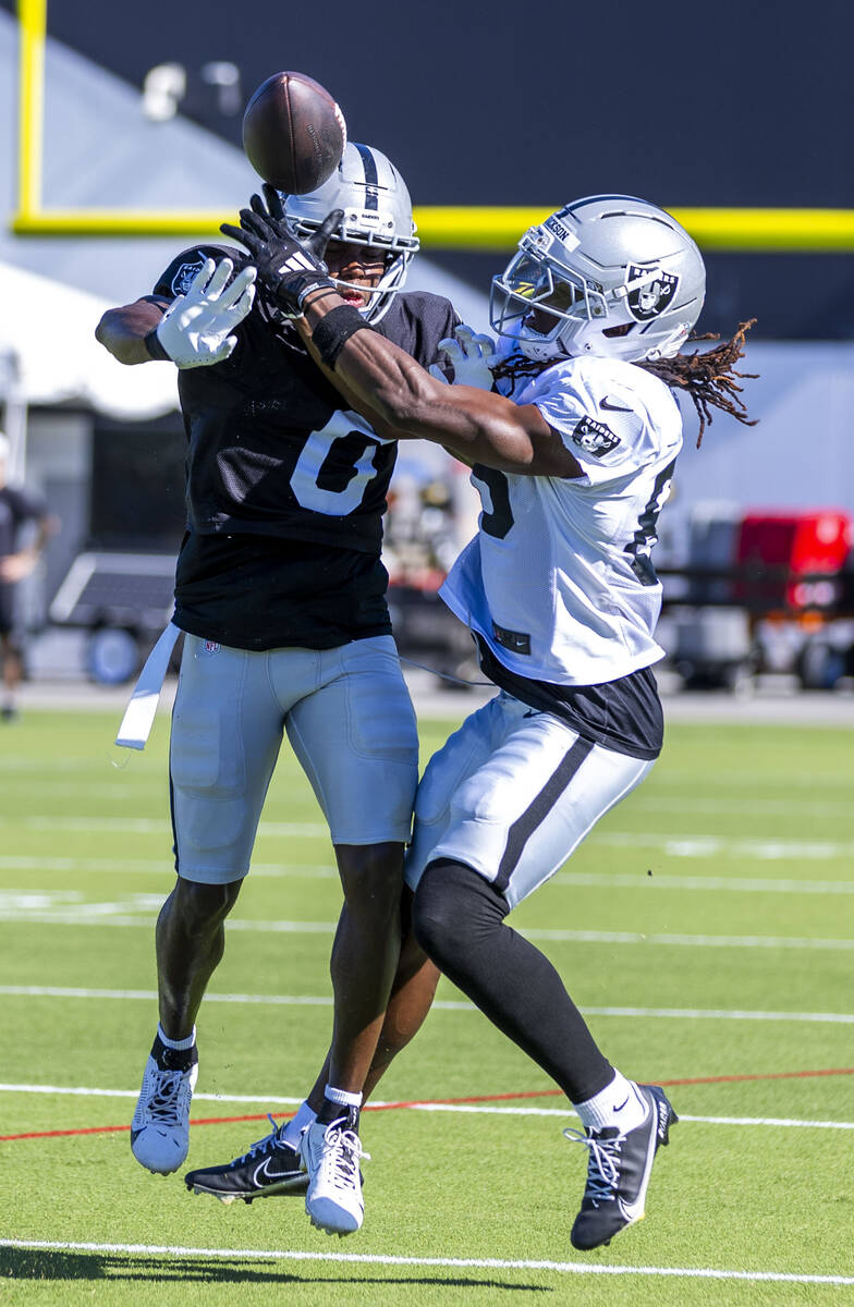 Raiders cornerback Jakorian Bennett (0) deflects away a pass intended for wide receiver Ketron ...