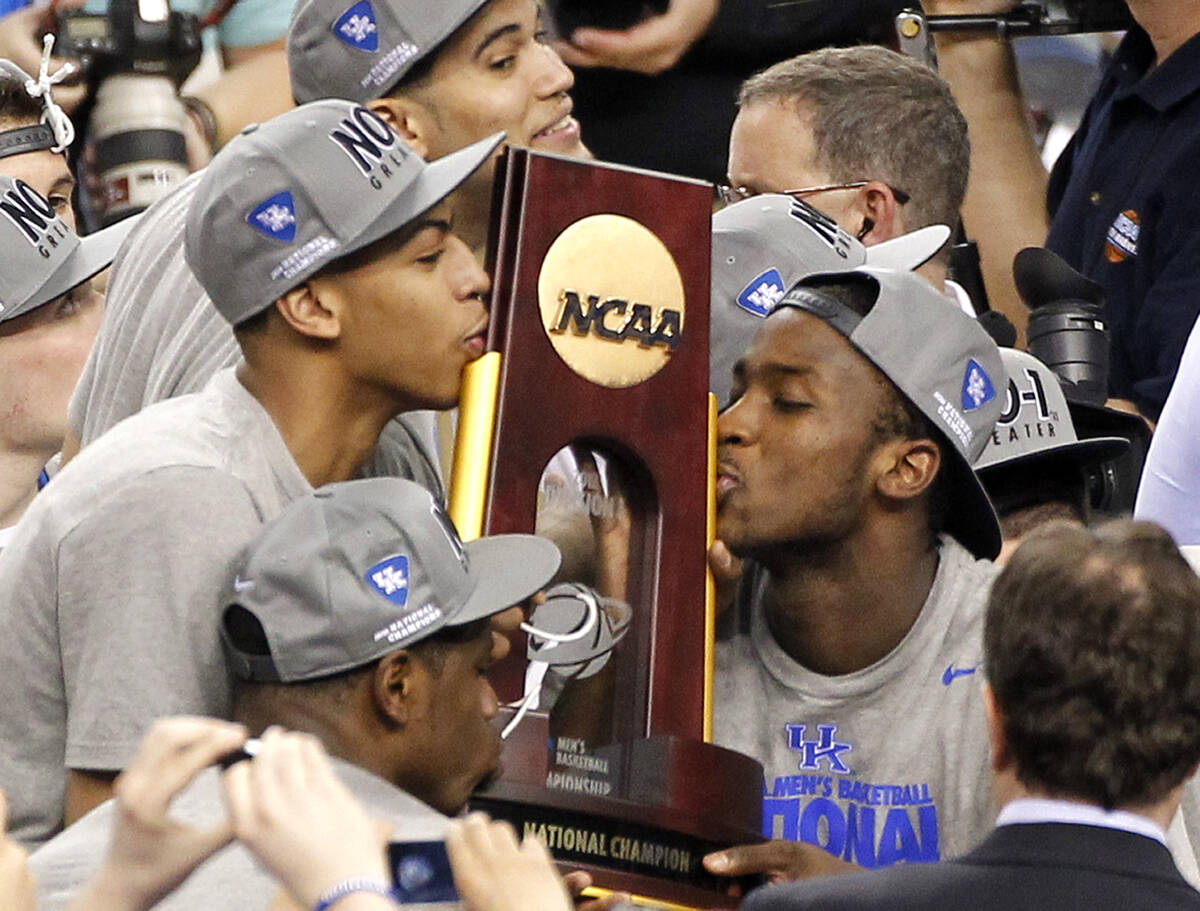 In this April 3, 2012, file photo, Kentucky forward Anthony Davis, left, and forward Michael Ki ...