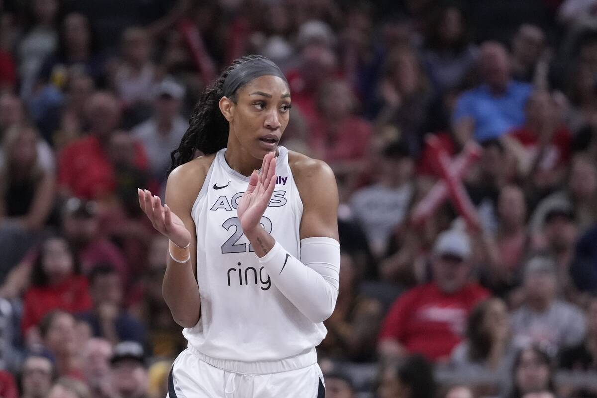Las Vegas Aces' A'ja Wilson reacts during the first half of a WNBA basketball game against the ...