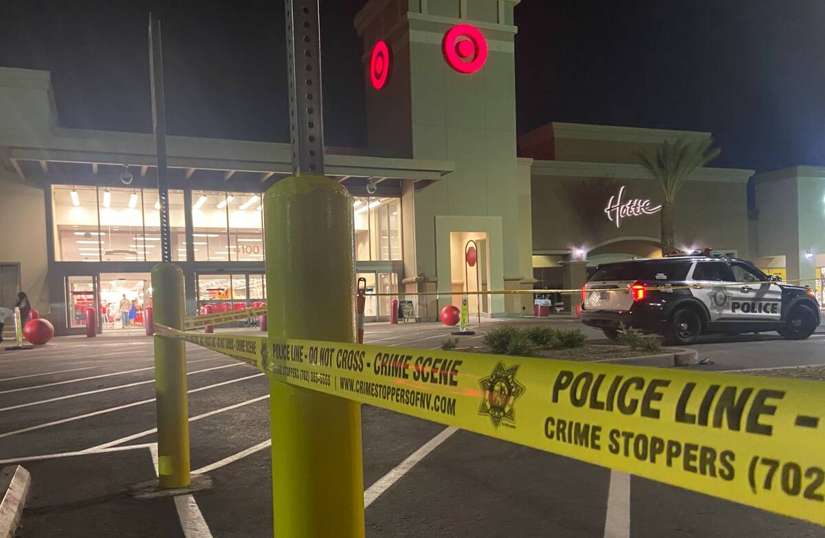 Police are seen outside of Target in the 4100 block of Blue Diamond Road in Las Vegas on Friday ...