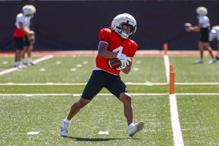 UNLV wide receiver DeAngelo Irvin Jr. (4) catches the ball during a drill at football practice ...