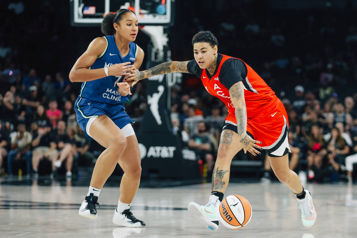 Minnesota Lynx forward Anastasiia Olairi Kosu (7) guards Aces forward Kierstan Bell (1) during ...