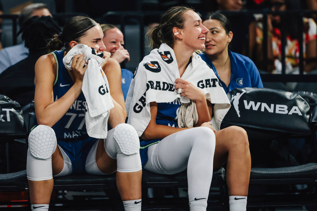 The Minnesota Lynx bench cheers during a WNBA basketball game between the Aces and Minnesota Ly ...