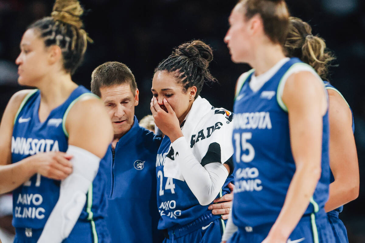 Minnesota Lynx forward Napheesa Collier (24) walks off the court with an injury during a WNBA b ...