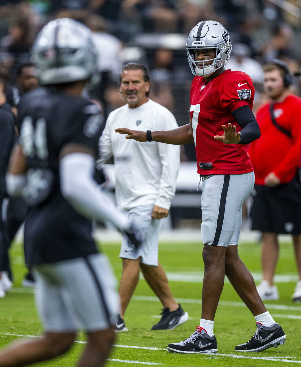Raiders quarterback Geno Smith (7) calls a play during the first half of a Raiders training cam ...