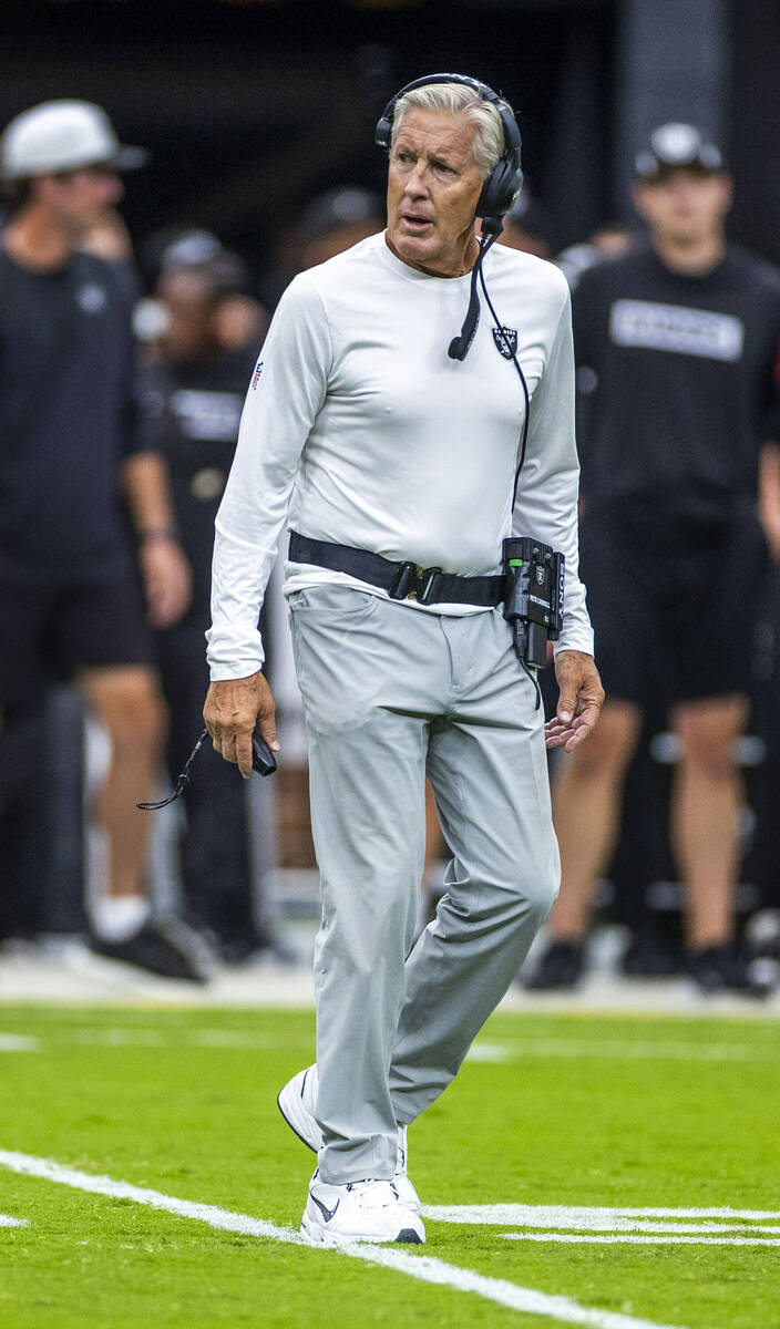 Raiders head coach Pete Carroll watches his players in action during the first half of a Raider ...