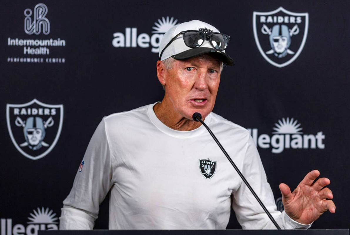 Raiders head coach Pete Carroll answers a question during an interview on the third day of trai ...