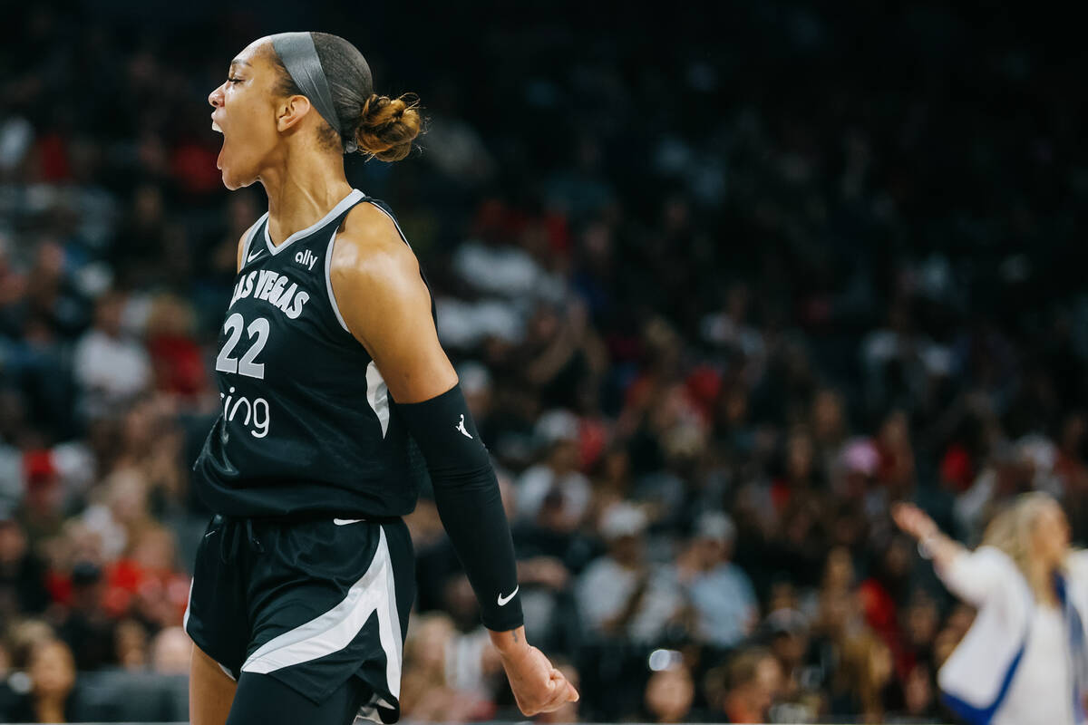 Aces center A'ja Wilson (22) celebrates drawing a foul during a WNBA game between the Aces and ...