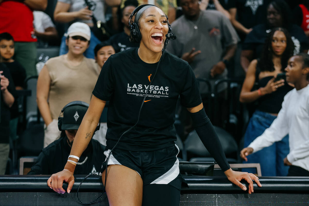 Aces center A'ja Wilson laughs during her post-game interview during a WNBA game between the Ac ...