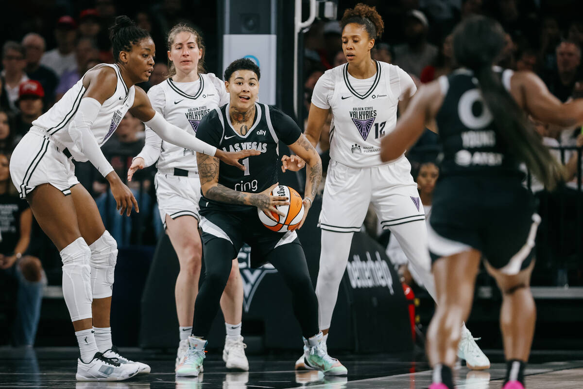 Aces forward Kierstan Bell (1) looks for an open teammate during a WNBA game between the Aces a ...