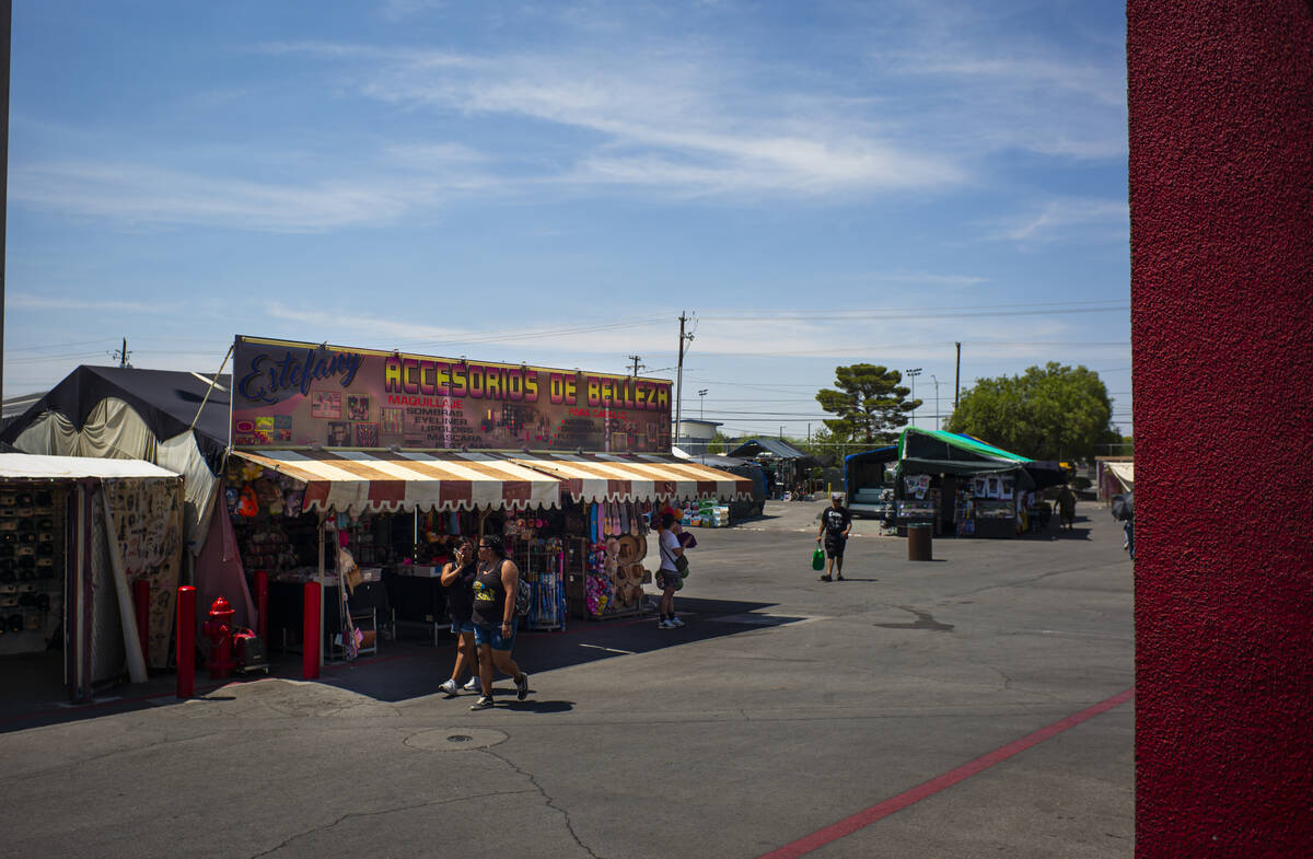 People explore the Broadacres Marketplace swap meet on Sunday, Aug. 3, 2025, in North Las Vegas ...