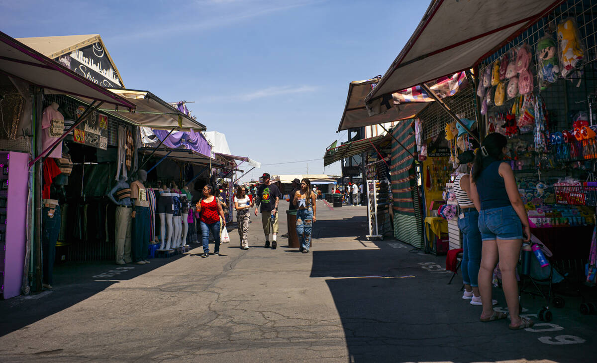 People explore the Broadacres Marketplace swap meet on Sunday, Aug. 3, 2025, in North Las Vegas ...