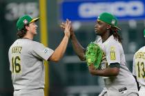 Athletics' Nick Kurtz (16) and Lawrence Butler celebrate after a baseball game against the Hous ...