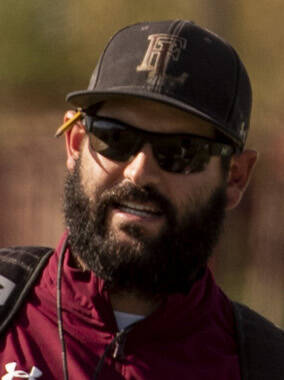 Assistant coach Jay Staggs leads a drill during practice at Faith Lutheran High School on Wedne ...