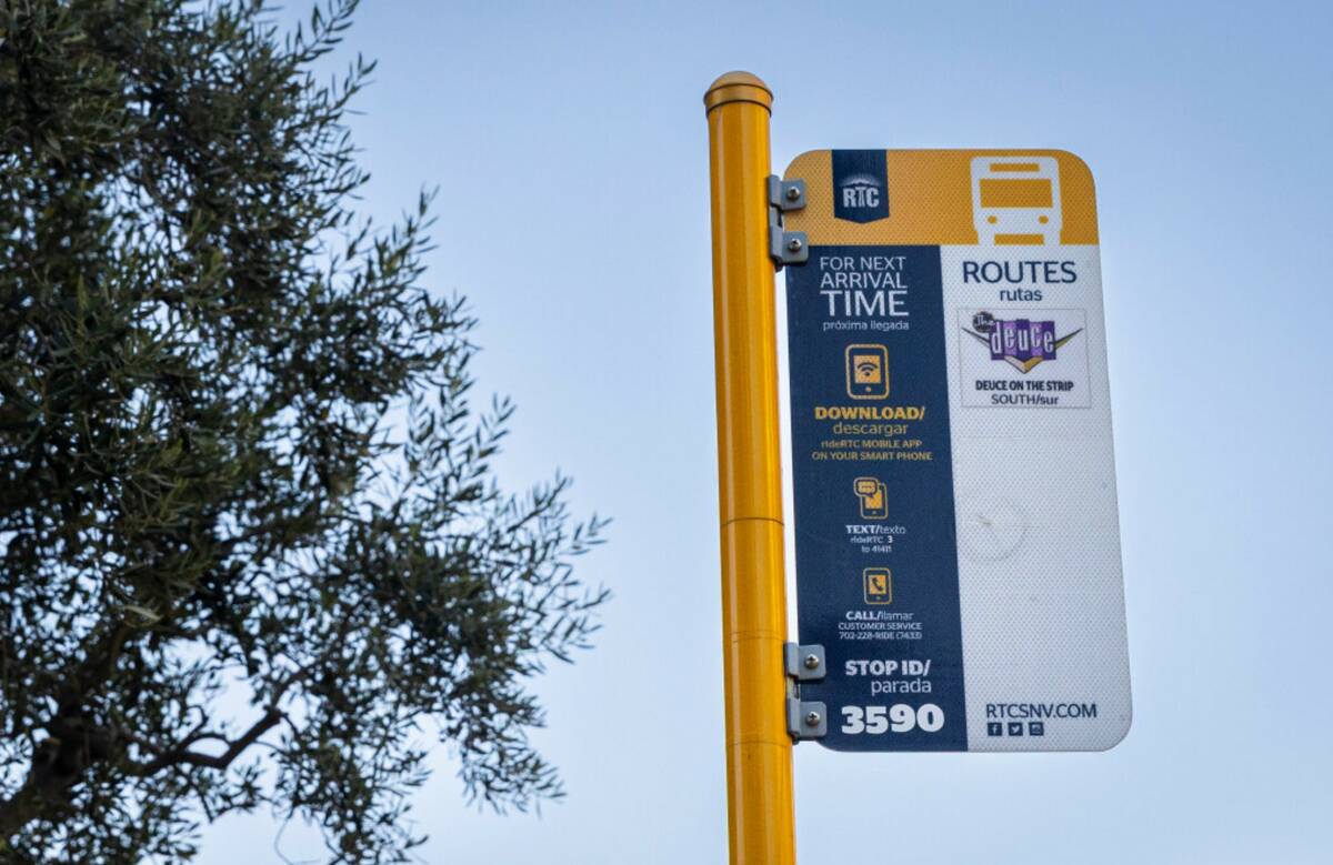 A sign for a Regional Transportation Commission bus stop between the Bellagio and The Cosmopoli ...