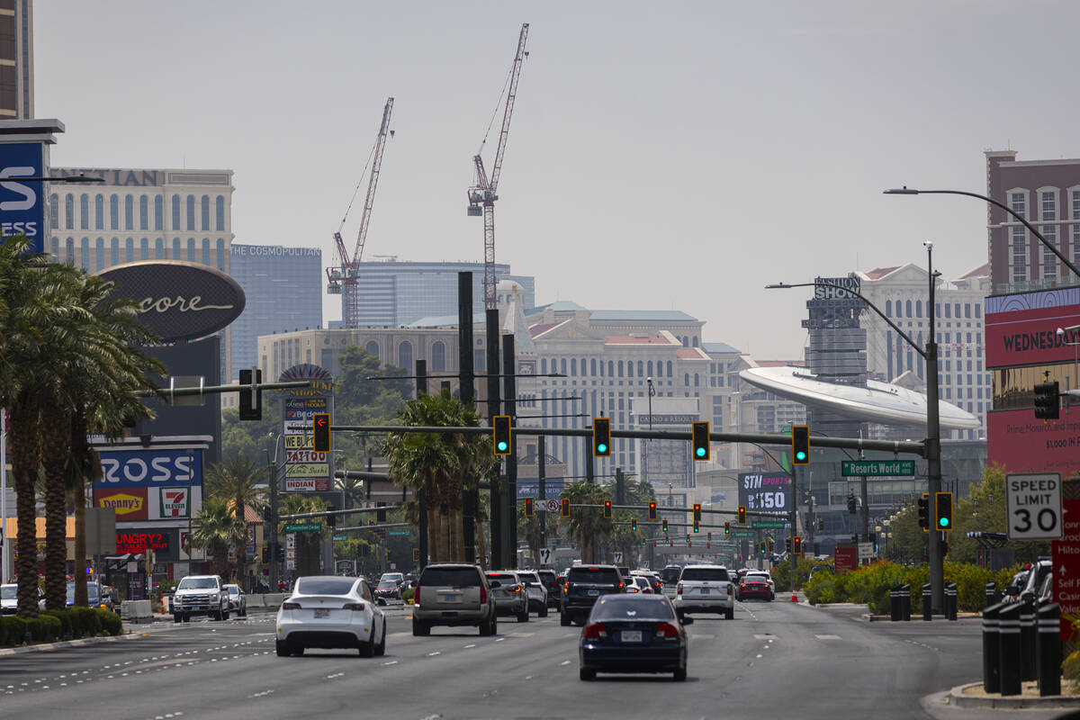 A hazy sky due to smoke from California wildfires is seen looking down the Strip on Monday, Aug ...