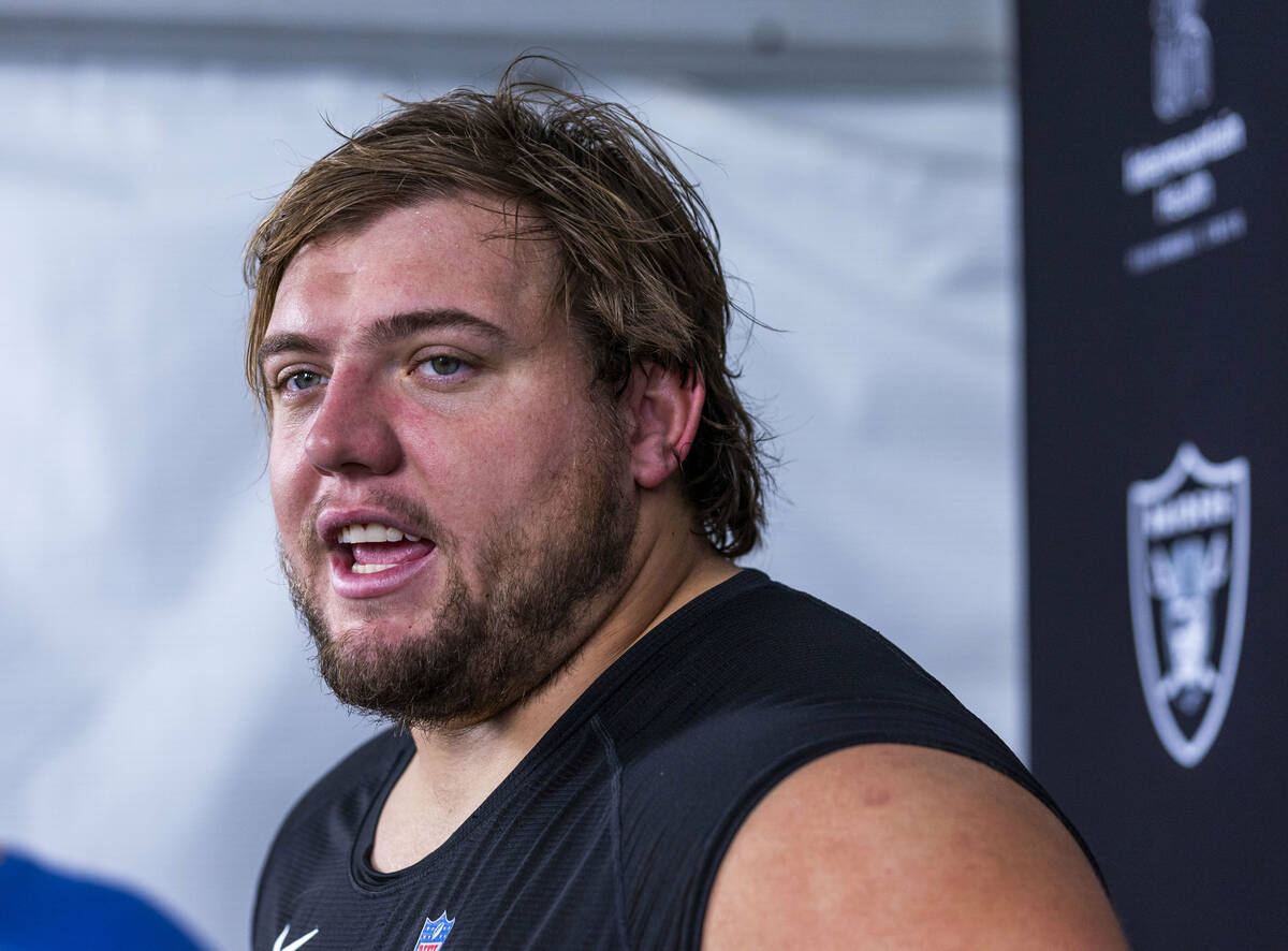 Raiders guard Jackson Powers-Johnson (58) speaks during an interview on the second day of train ...