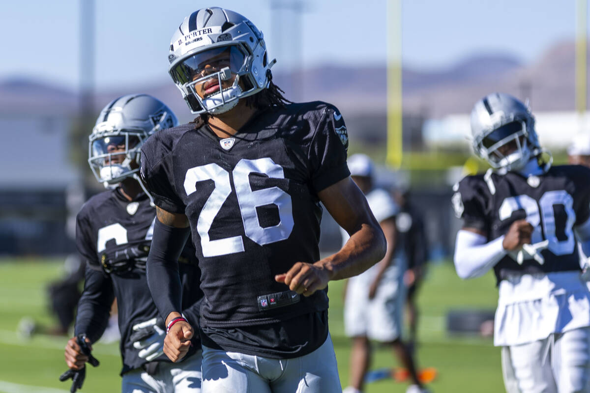 Raiders cornerback Darien Porter (26) warms up during training camp on Thursday, July 31, 2025, ...