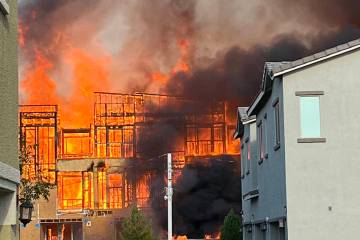 A fire at a construction site rages Tuesday, Aug. 5, 2025, on the 6500 block of North 5th Stree ...