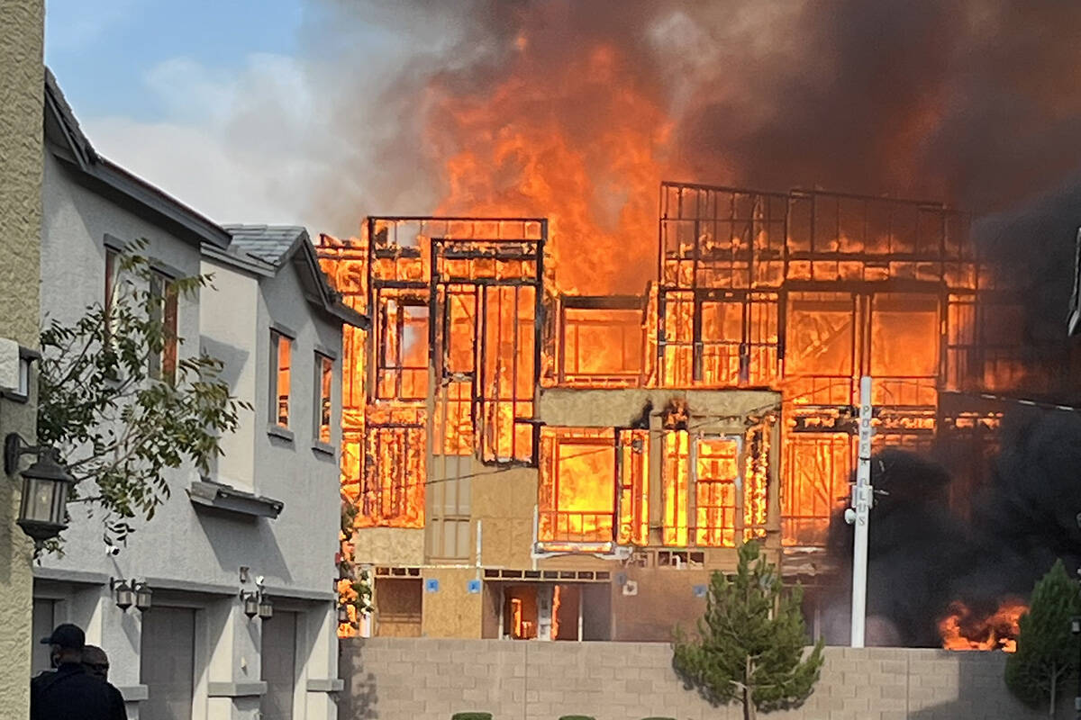 Smoke and flames erupt from a construction site fire in North Las Vegas Tuesday, August 5, 2025 ...