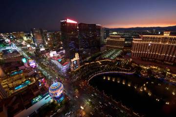 Cars drive along the Las Vegas Strip, Saturday, Aug. 2, 2025, in Las Vegas. (AP Photo/John Locher)