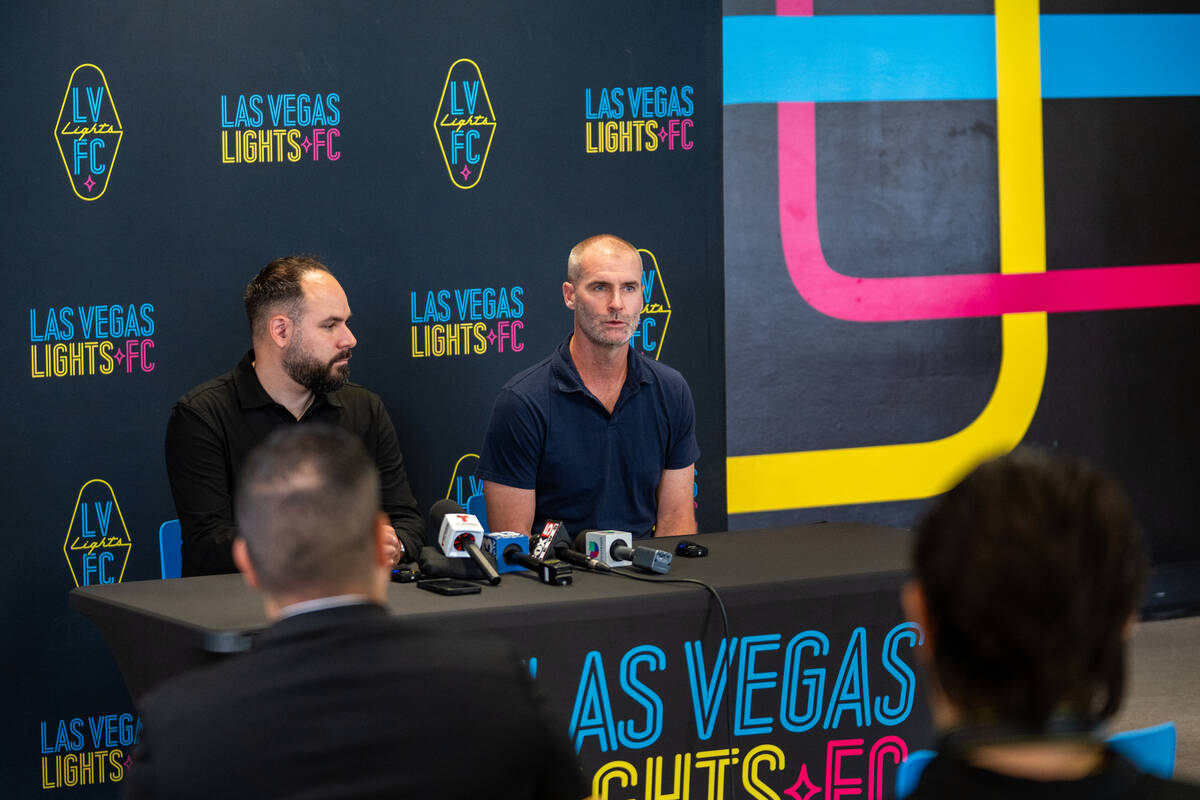 Las Vegas Lights FC introduces their new head coach, Devin Rensing (right), during a news confe ...