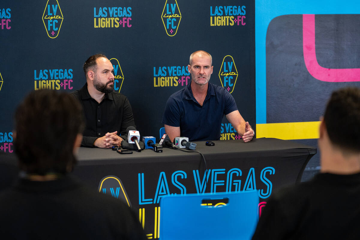 Las Vegas Lights FC introduces their new head coach, Devin Rensing (right), during a news confe ...