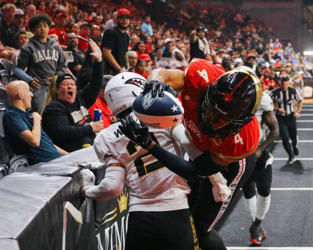 Knight Hawks wide receiver Quentin Randolph (4) leaps over San Diego Strike Force defensive bac ...