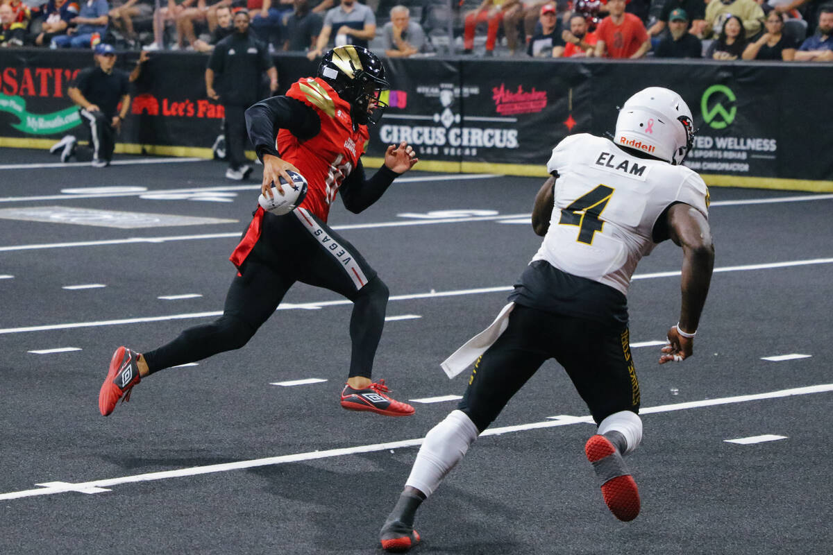 Knight Hawks quarterback Jayden De Laura (10) runs with the ball during the Indoor Football Lea ...