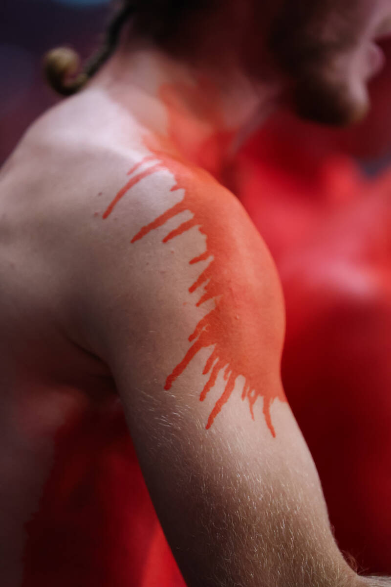 Red paint decorates the shoulder of a Knight Hawks fan during the Indoor Football League&#x2019 ...