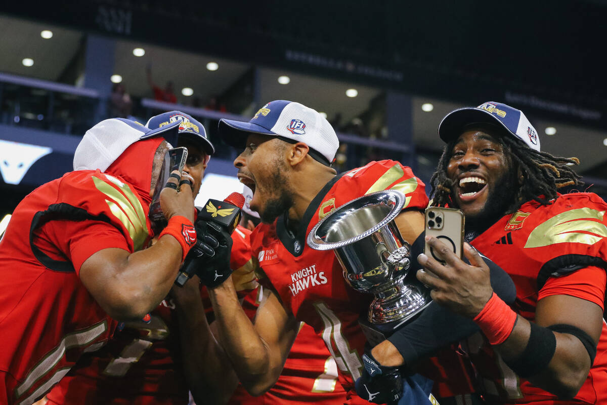 Knight Hawks defensive back James Caesar (12), wide receiver CJ Windham Jr. (7), wide receiver ...