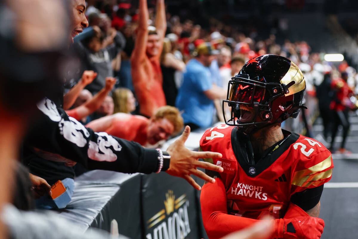 Knight Hawks defensive back Elijah Blades (24) celebrates making a stop in overtime during the ...