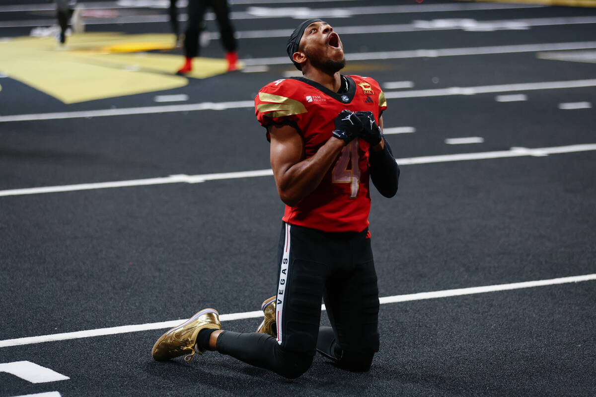 Knight Hawks wide receiver Quentin Randolph (4) celebrates winning the Indoor Football League&# ...