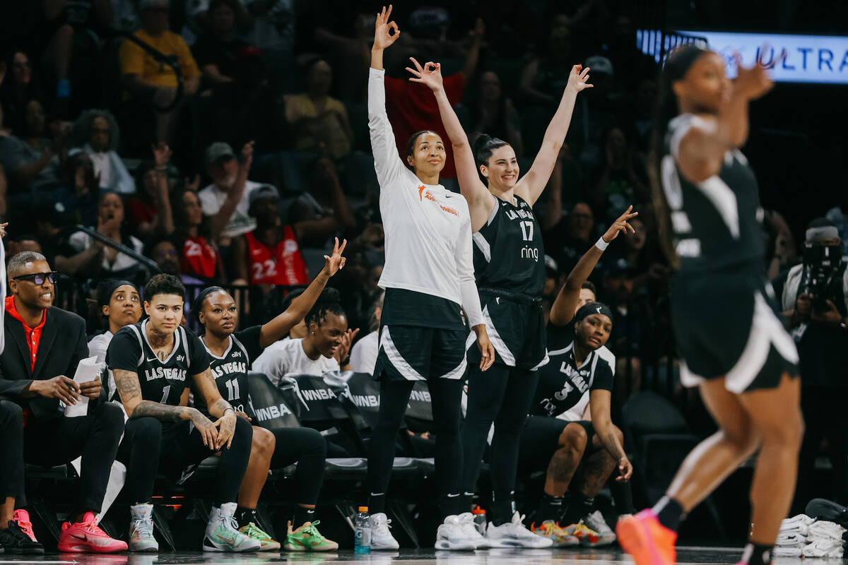 The Aces bench celebrates during a WNBA game between the Aces and Golden State Valkyries at Mic ...