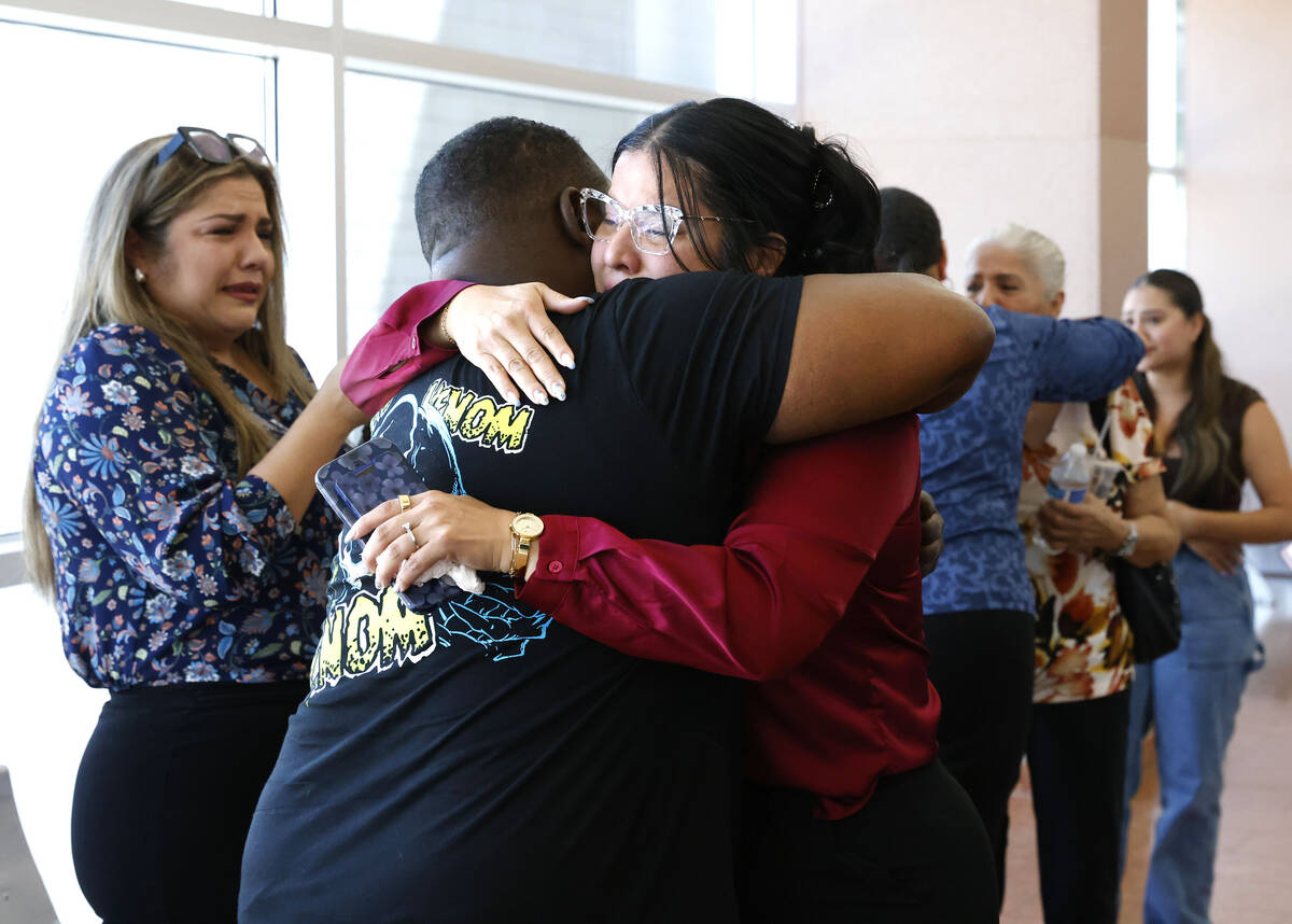 Anabel Sarabia, right, the mother of a shooting victim Angelina Erives, 11, and Dion George, th ...