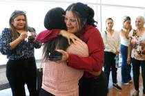 Anabel Sarabia, center right, the mother of a shooting victim Angelina Erives, 11, and Janicee ...