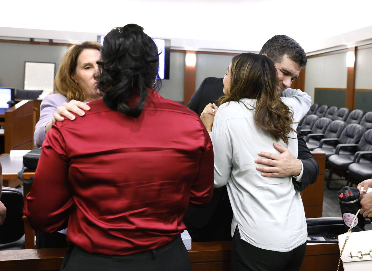 Anabel Sarabia, second left, the mother of Angelina Erives, 11, a shooting victim, and her daug ...