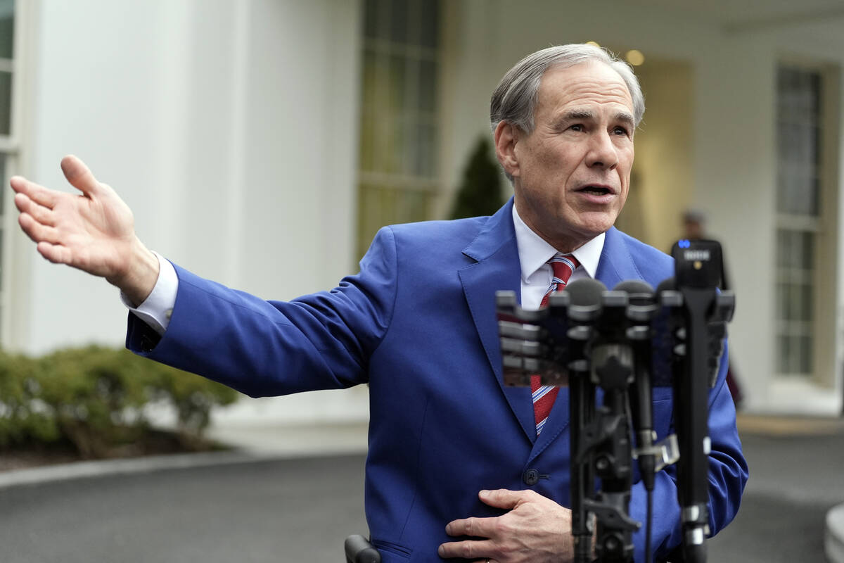 Texas Gov. Greg Abbott speaks to reporters outside the West Wing of the White House, Feb. 5, 20 ...