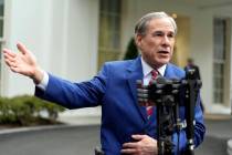 Texas Gov. Greg Abbott speaks to reporters outside the West Wing of the White House, Feb. 5, 20 ...