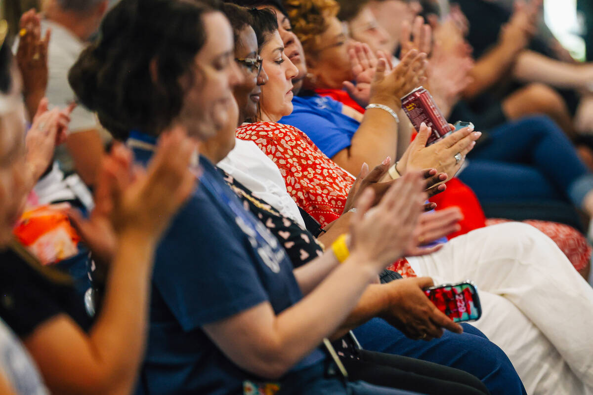 A crowd claps during the Frank F. Garside Junior High School ribbon cutting ceremony at Frank F ...
