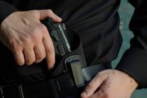 Nevada casino regulators made it easier for resorts to hire armed security guards when it made ...
