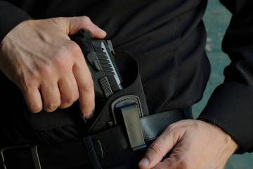 Nevada casino regulators made it easier for resorts to hire armed security guards when it made ...