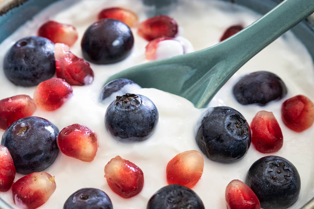 Foods that are high in protein, such as Greek yogurt, can help people feel full for longer peri ...