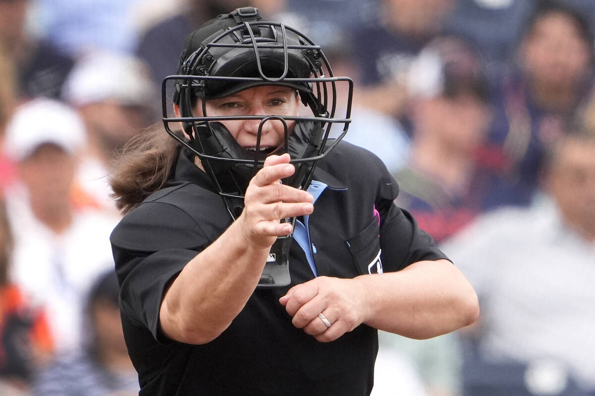 Home plate umpire Jen Pawol calls a strike during the third inning of a spring training basebal ...