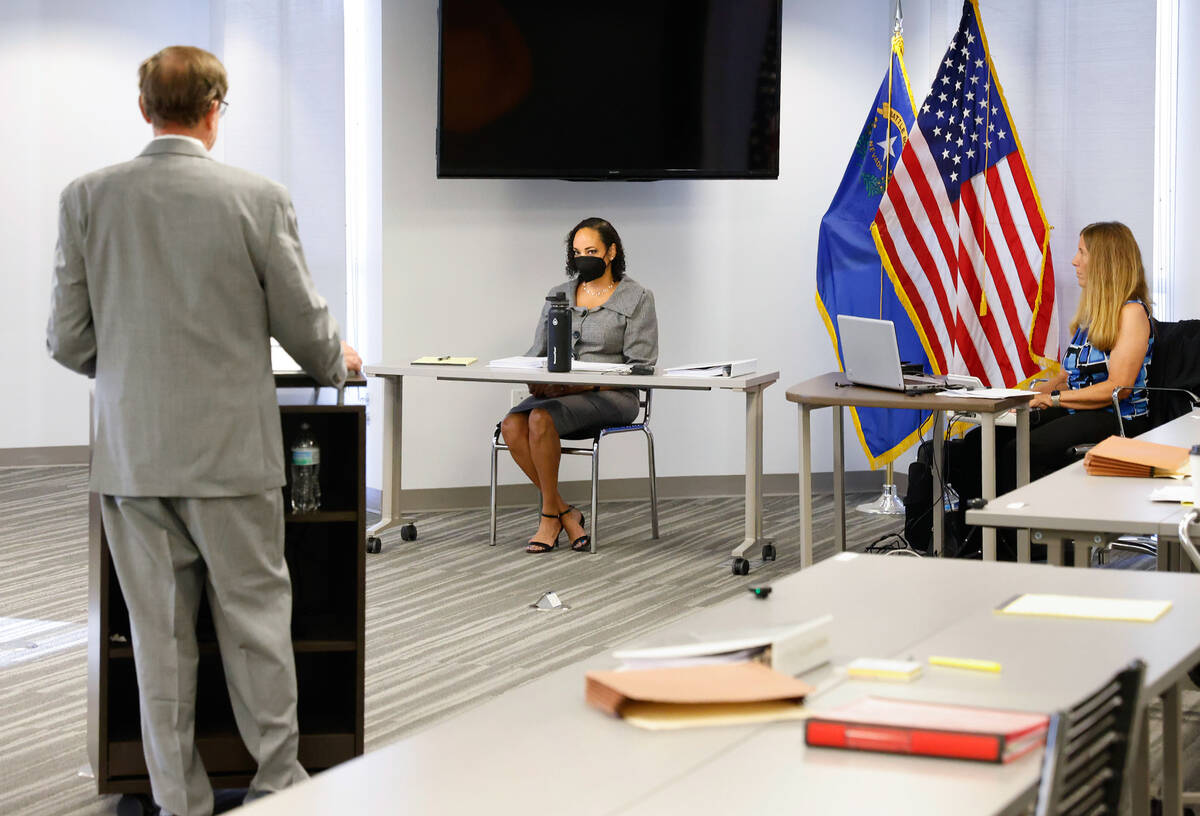 District Court Judge Erika Ballou, center, who is accused of defying the Nevada Supreme Court, ...