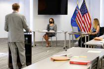 District Court Judge Erika Ballou, center, who is accused of defying the Nevada Supreme Court, ...